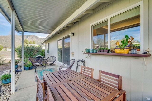 view of patio with a mountain view