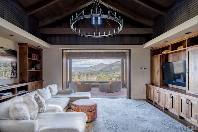 living room featuring wood ceiling, a chandelier, high vaulted ceiling, and beamed ceiling