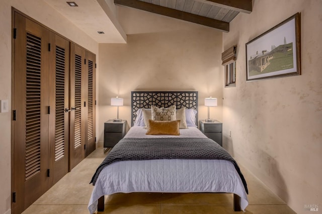 bedroom with wooden ceiling and vaulted ceiling with beams