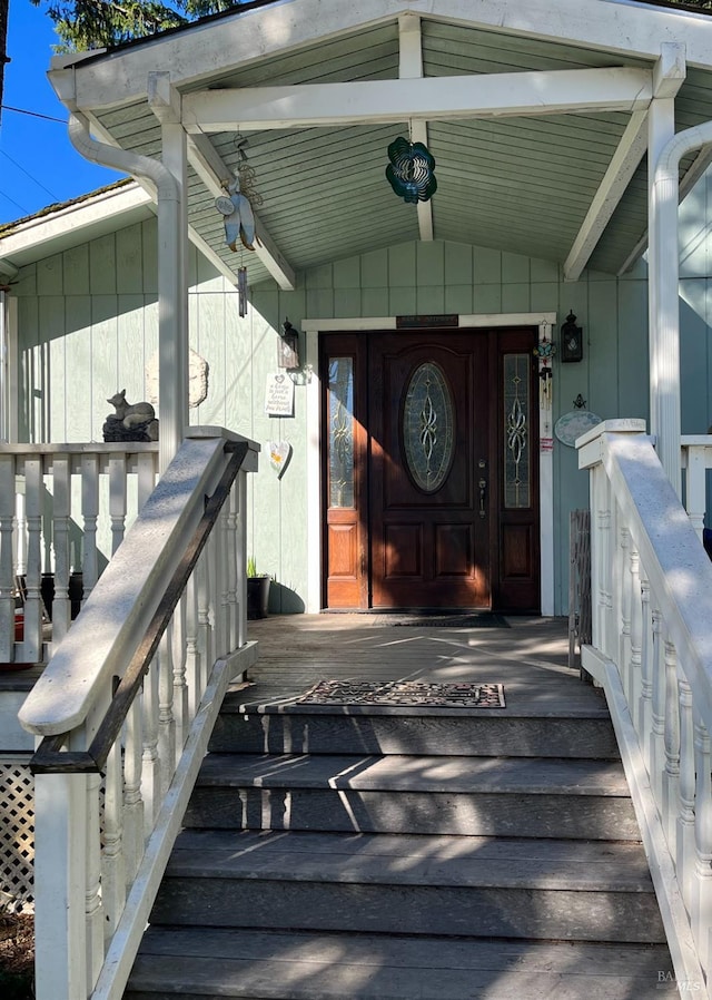 entrance to property with a porch