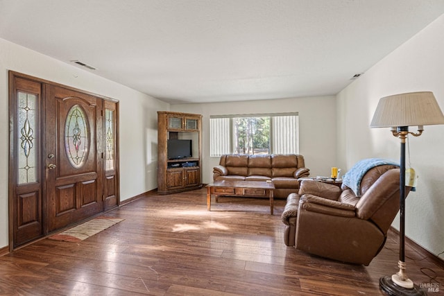 living room with dark wood-type flooring