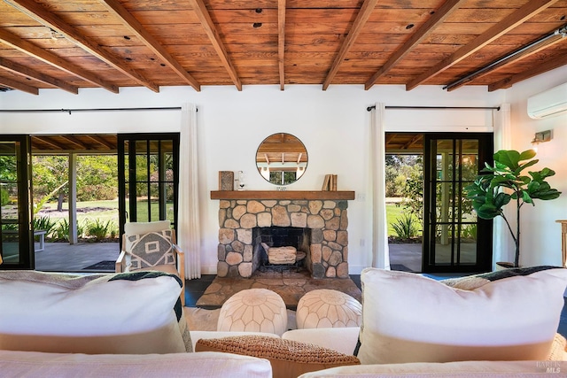 living room with wooden ceiling, beamed ceiling, and a stone fireplace