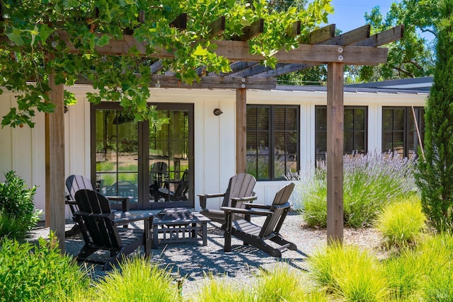 view of patio featuring french doors and a pergola