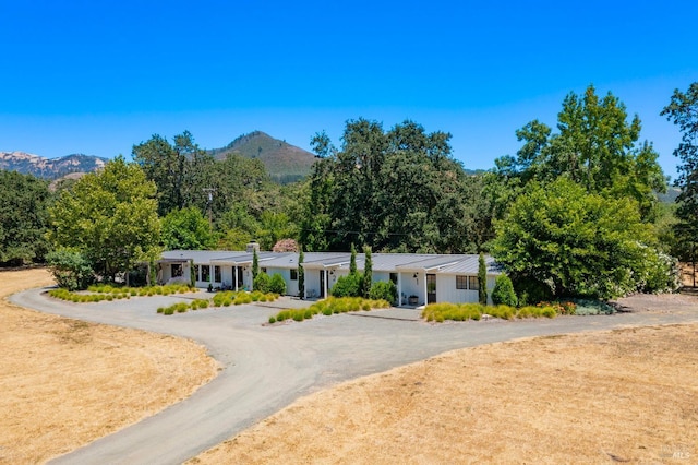 single story home with a mountain view