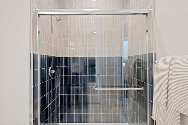 full bath featuring a stall shower