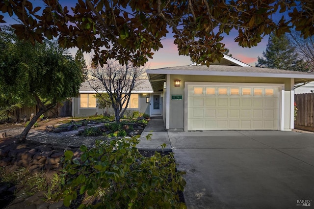 view of front of property featuring a garage