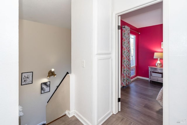 hallway featuring wood-type flooring