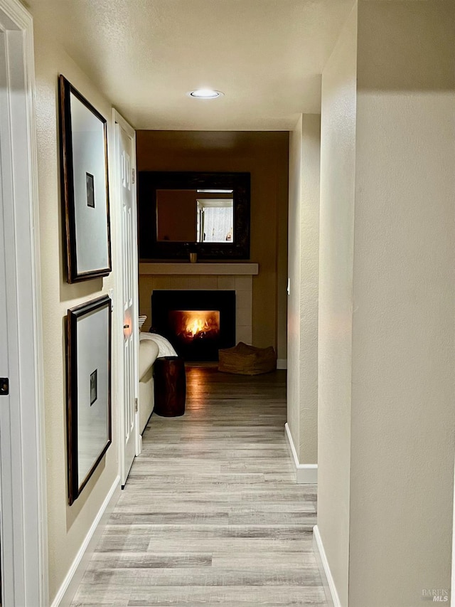 corridor featuring light wood-type flooring