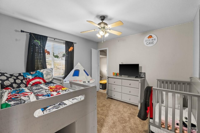 carpeted bedroom featuring ceiling fan