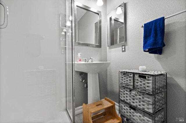 bathroom with walk in shower