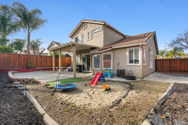 rear view of property with a patio area