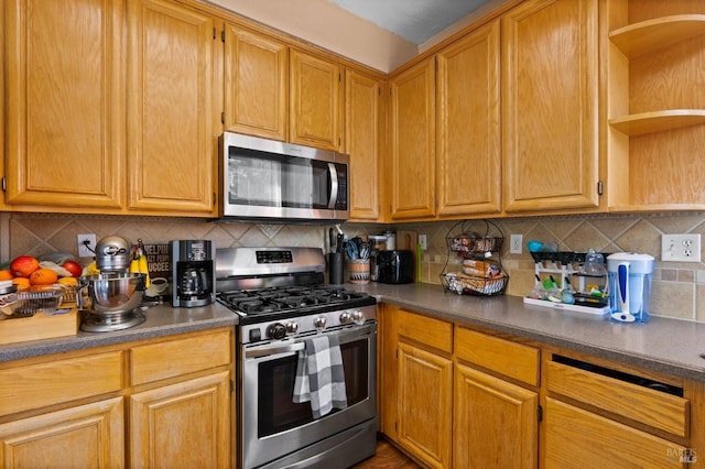 kitchen featuring backsplash and stainless steel appliances