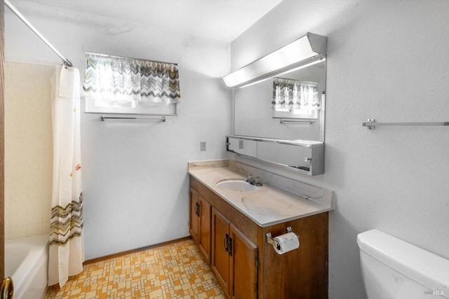 full bath featuring toilet, vanity, baseboards, tile patterned floors, and shower / bathtub combination with curtain