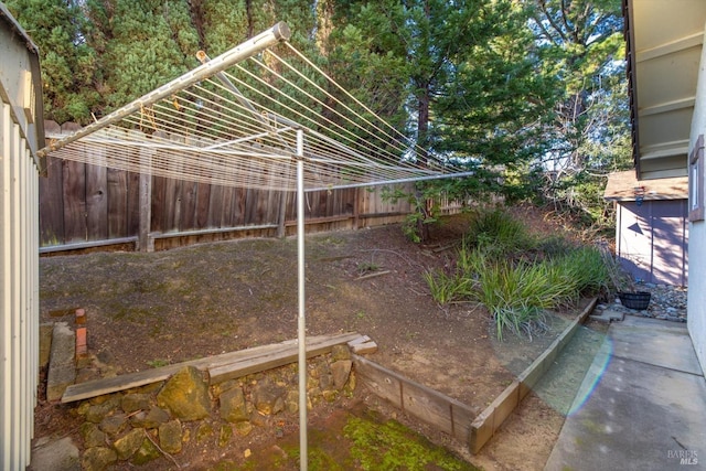 view of yard featuring fence