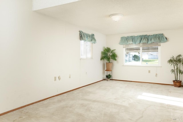 unfurnished room featuring carpet floors