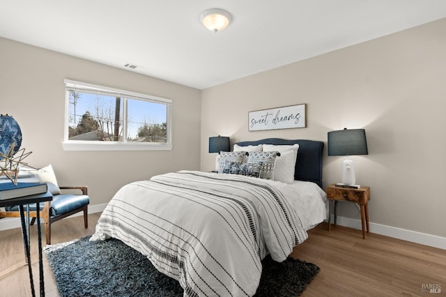 bedroom featuring hardwood / wood-style flooring