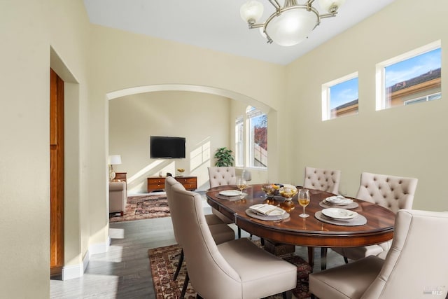 dining area with dark hardwood / wood-style flooring