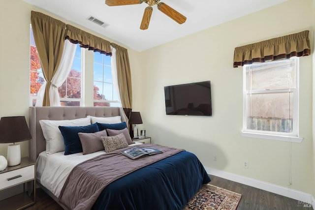 bedroom featuring dark wood-type flooring and ceiling fan