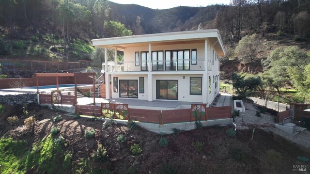 balcony featuring a mountain view