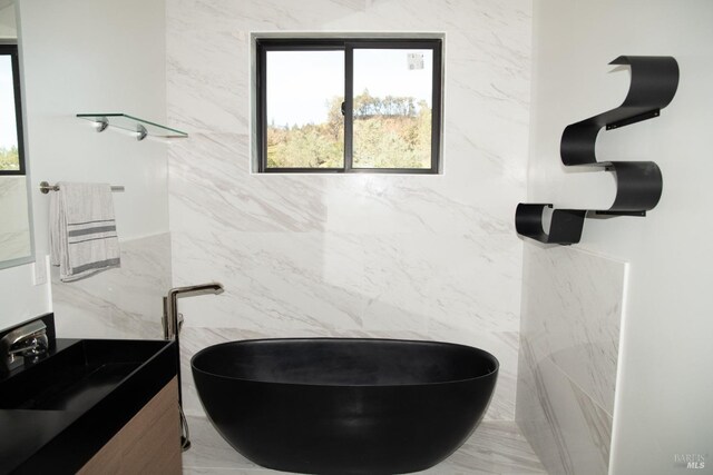 bathroom featuring tiled shower