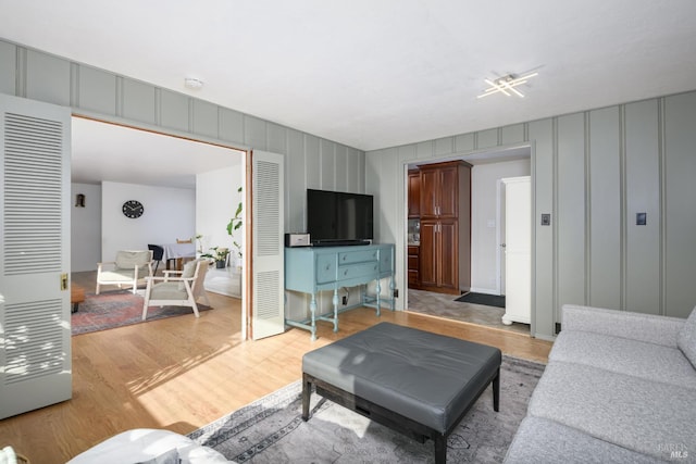 living room with light hardwood / wood-style floors