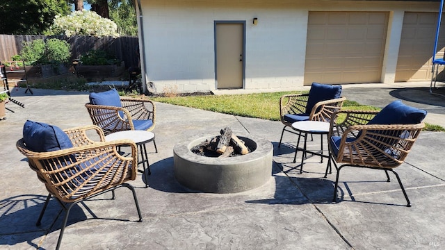 view of patio / terrace with an outdoor fire pit