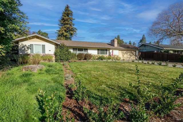 view of front facade with a front lawn