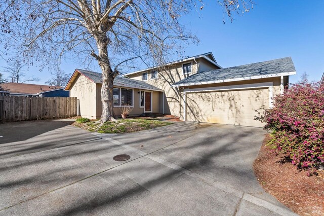 view of front of home with a garage