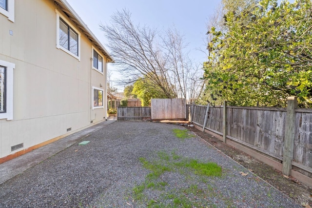 view of yard featuring a fenced backyard