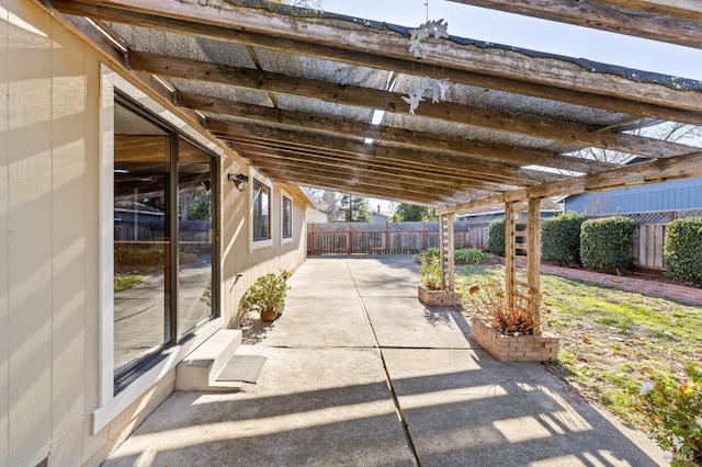 view of patio featuring a fenced backyard and a pergola