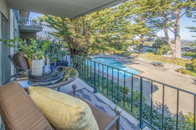 balcony featuring a patio area