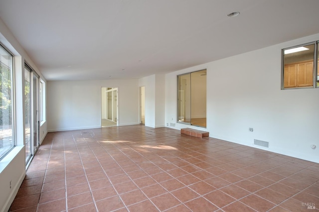 view of tiled spare room