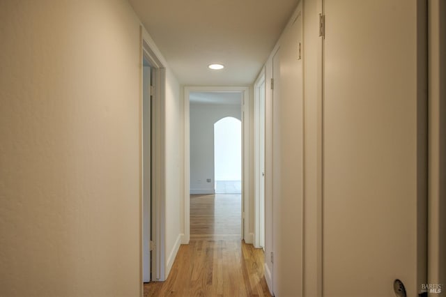 hall with light wood-type flooring