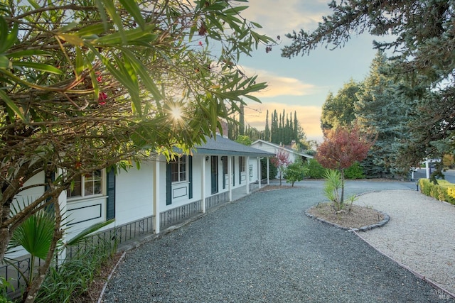 view of property exterior at dusk