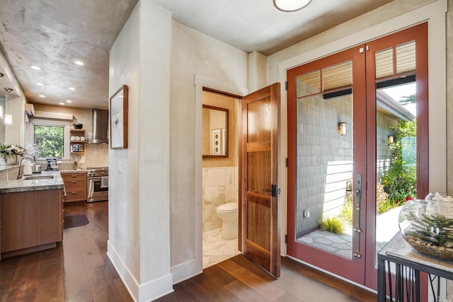 interior space with dark wood-type flooring and sink