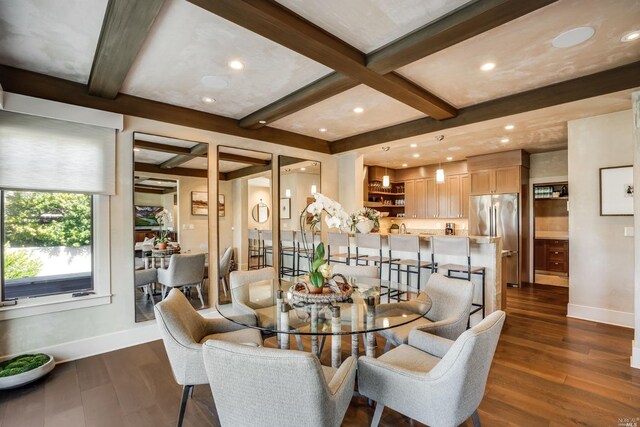 dining area featuring dark hardwood / wood-style flooring, coffered ceiling, and beamed ceiling