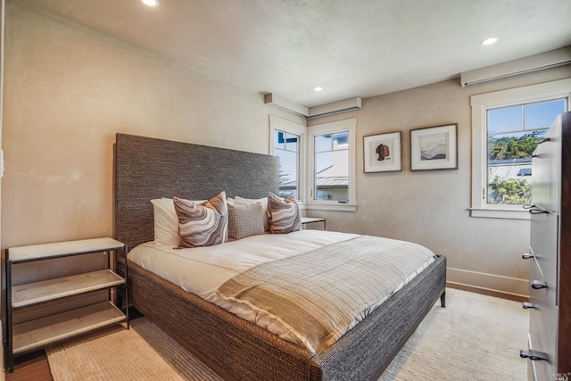 bedroom featuring light hardwood / wood-style floors