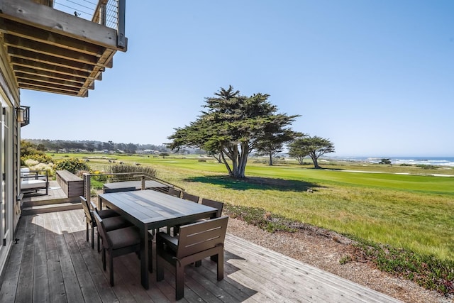 wooden terrace featuring a water view