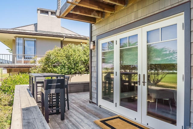 wooden deck with french doors