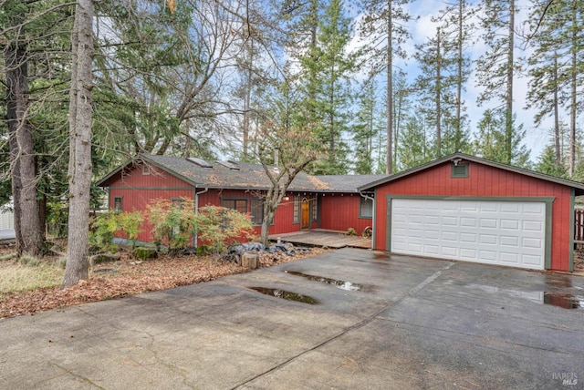 ranch-style house featuring a garage