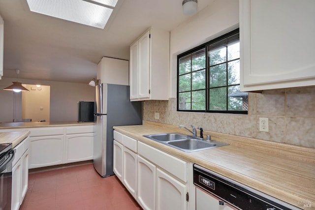 kitchen featuring white cabinetry, backsplash, dishwasher, hanging light fixtures, and sink