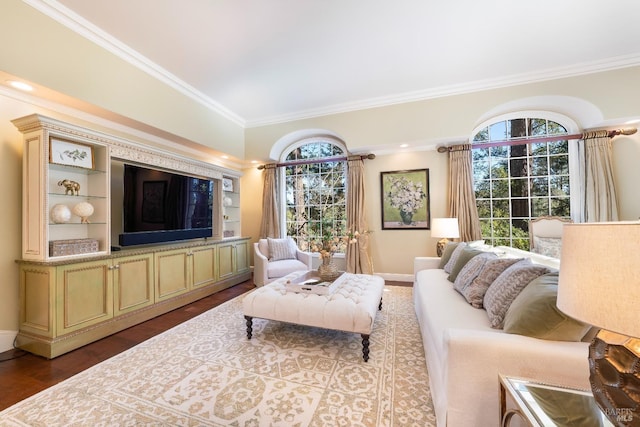 living area featuring ornamental molding, recessed lighting, wood finished floors, and baseboards