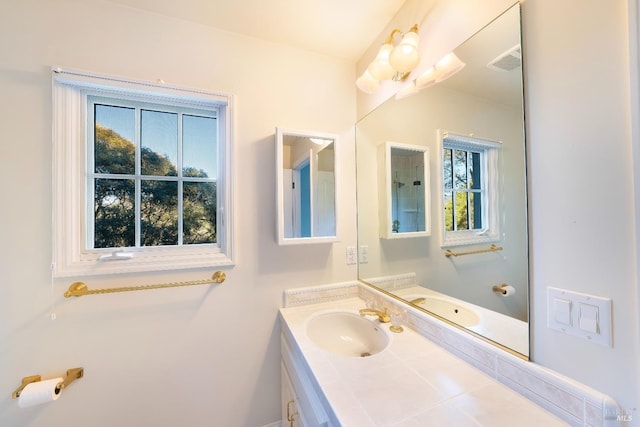 bathroom featuring visible vents and vanity