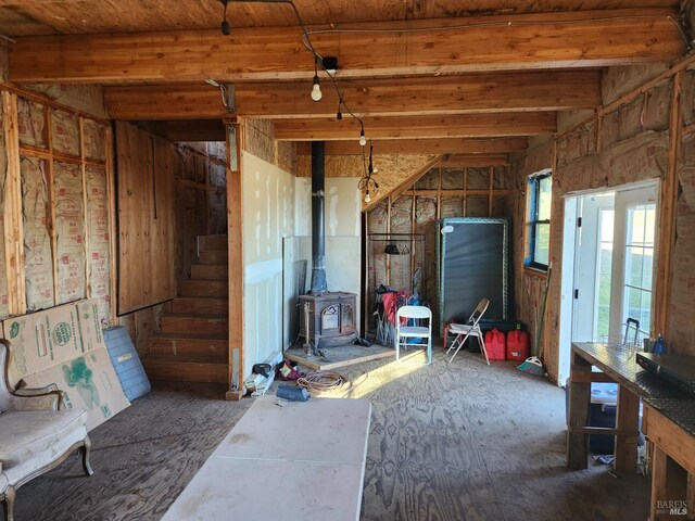6851 Third Gate Rd, Willits, CA 95490 - below grade area featuring a wood stove and stairs