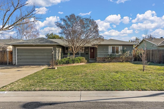 single story home featuring a front yard and a garage