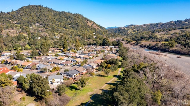 birds eye view of property with a residential view and a mountain view