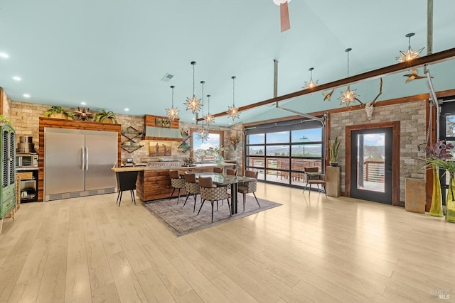 kitchen with ceiling fan, appliances with stainless steel finishes, and light wood-style floors