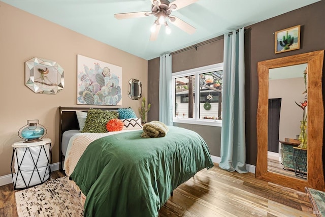 2135 E 2nd St, Benicia, CA 94510 - bedroom with baseboards, ceiling fan, and wood finished floors