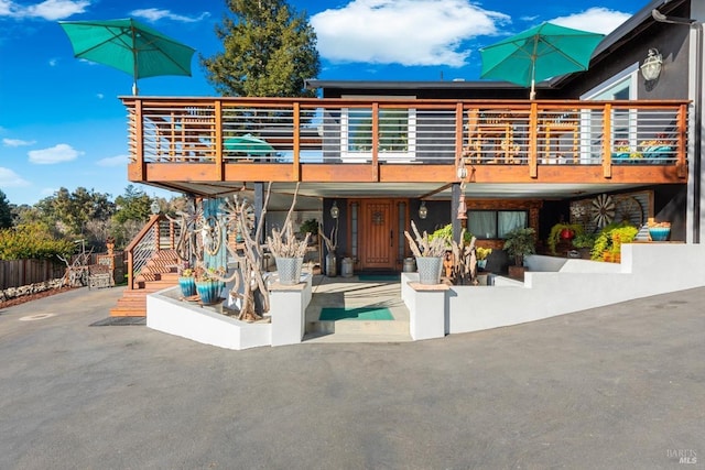 2135 E 2nd St, Benicia, CA 94510 - back of property with a patio, stairway, and a deck