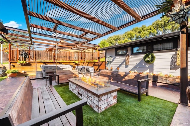 view of patio featuring an outdoor living space with a fire pit, fence, and a pergola